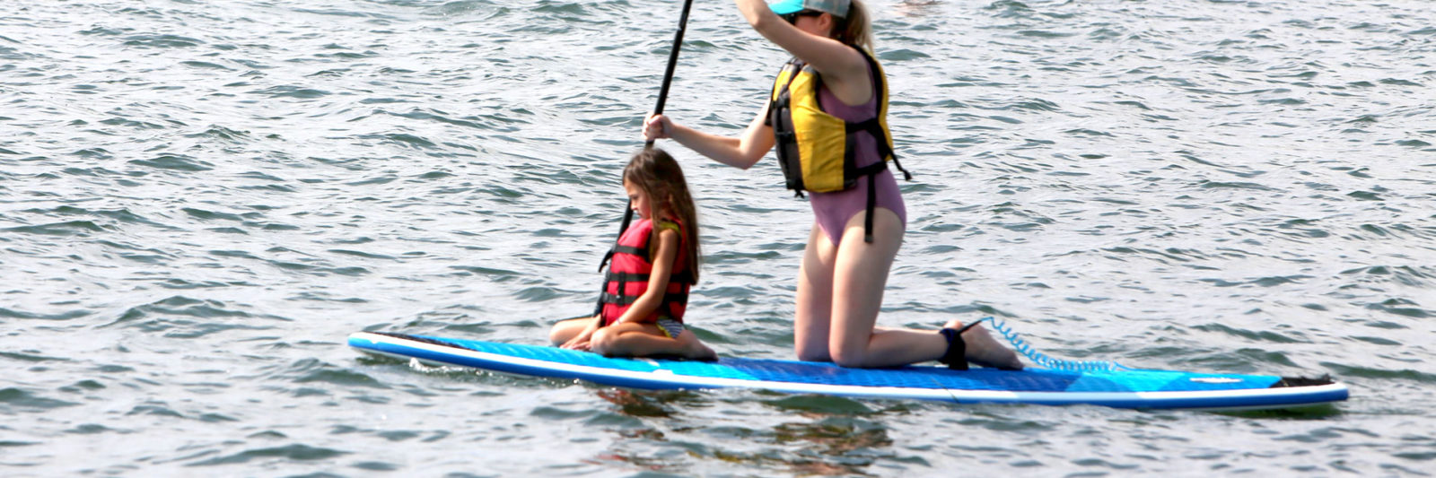 Mother and child SUP on Lake GEneva
